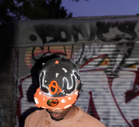 ORANGE AND BLACK “LOUVE” FITTED CAP